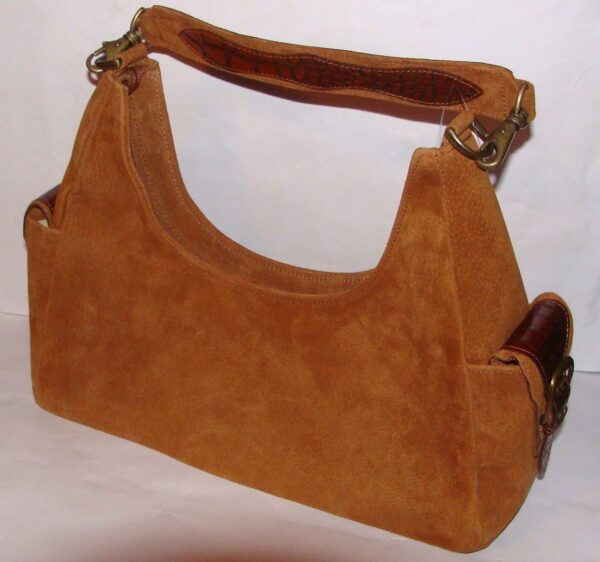 A Scully Croc print genuine leather Bolero western purse on a white surface.