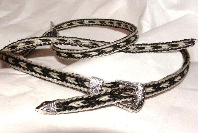 A black and white braided belt with a Sterling Silver Buckle, white and Black Horse hair hat band USA.