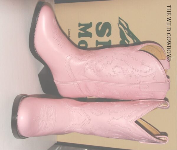 A pair of Child size 12 "Pink Denver" leather cowboy boots sitting on top of a box.