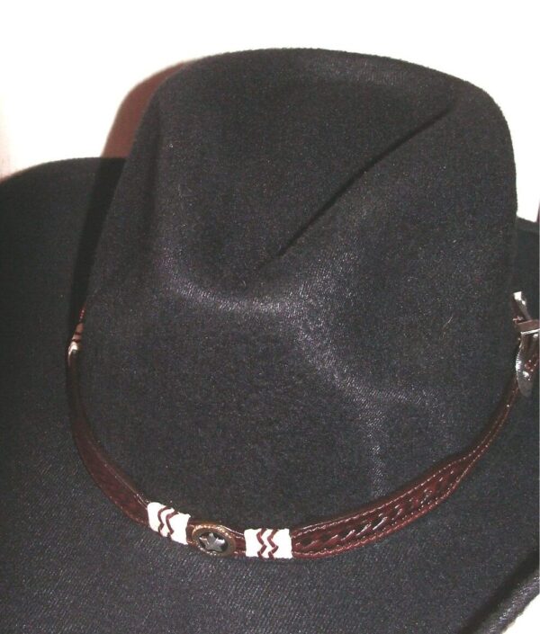 A black cowboy hat with a Brown basketweave leather Rawhide star hat band.