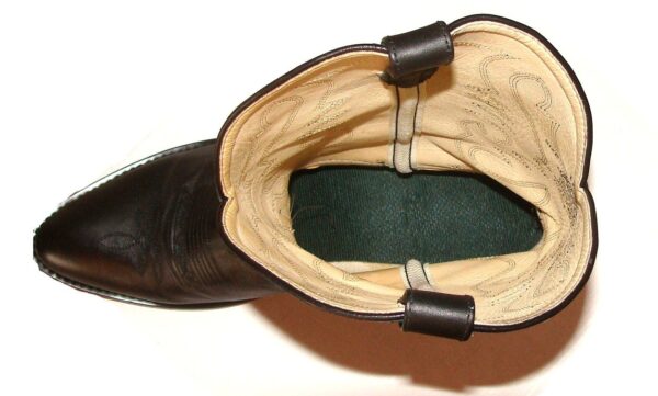 A close up of the inside of a SZ: 5 "Denver" Black leather youth cowboy boot.