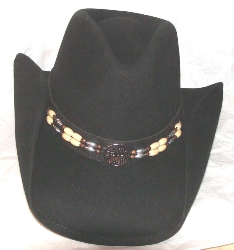 A black cowboy hat with a beaded belt.