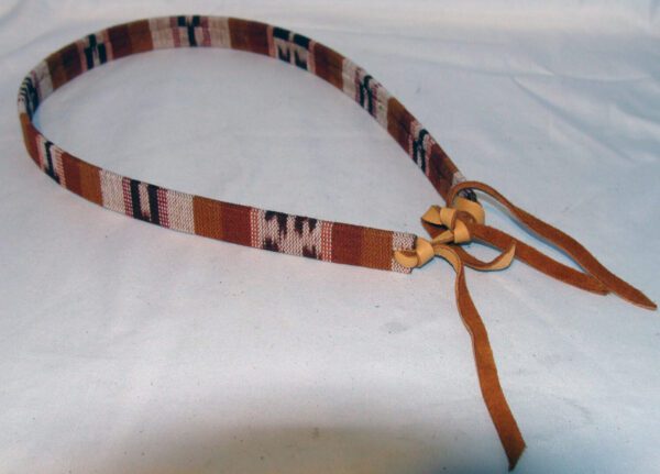 A Tapestry Brown Southwestern Cowboy Hat Band with a brown and tan ribbon.