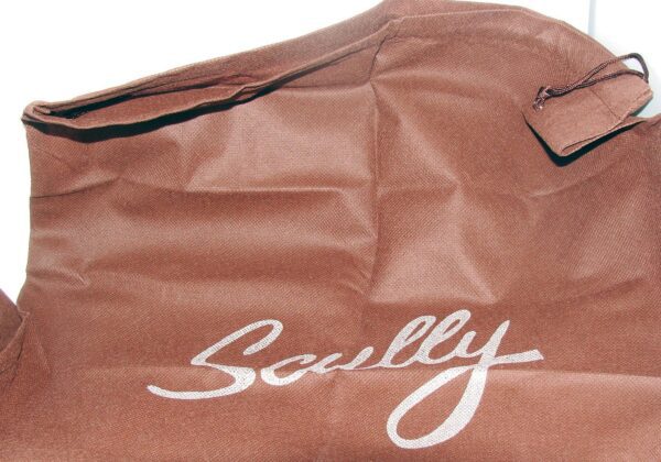 A brown Scully USA American Flag Cross Body Suede Handbag Purse with the word scully on it.