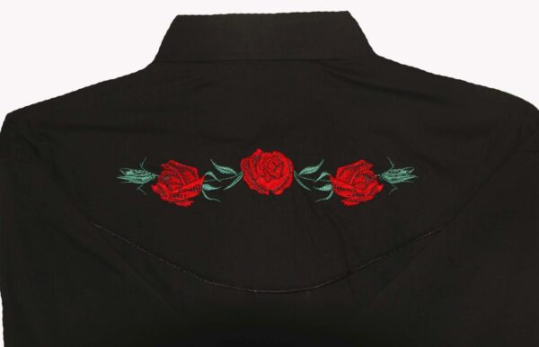 A Womens Red Texas Rose Black Western Shirt with red roses embroidered on it.