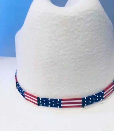 A white Glass quill 5 strand "USA Flag" USA MADE hat band with an american flag on it.