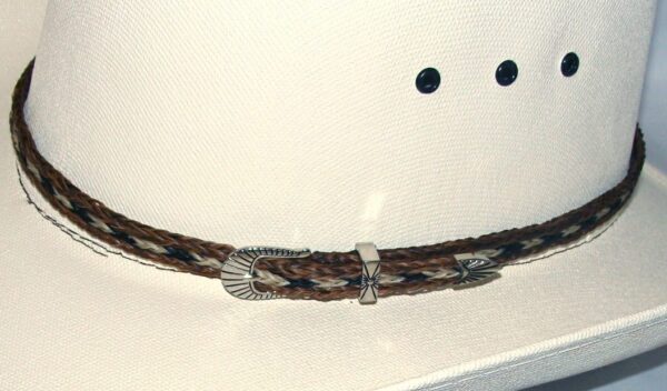 A cowboy hat with a Sterling Silver Buckle, Brown, Black Horse hair hat band - USA.