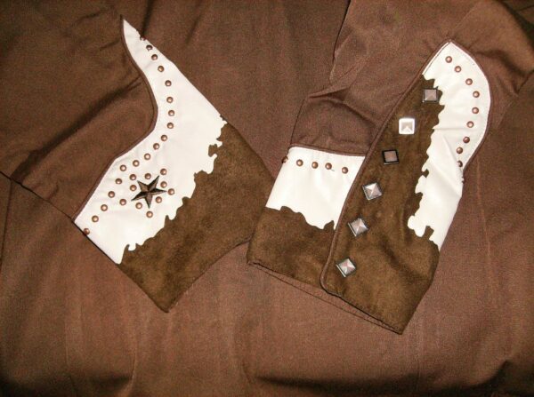 A pair of Scully 'Lady Bonanza' brown western star women's fringe shirts.