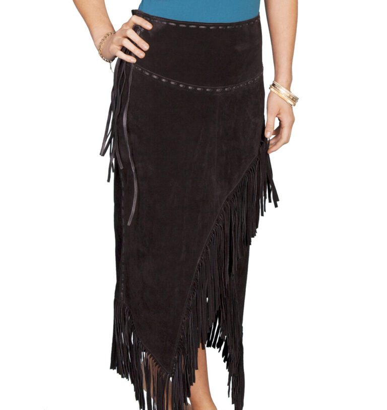 A woman confidently posing in a Women's Native Long Suede Black Fringe Skirt, showcasing the trendy fashion of women's fringe skirts.