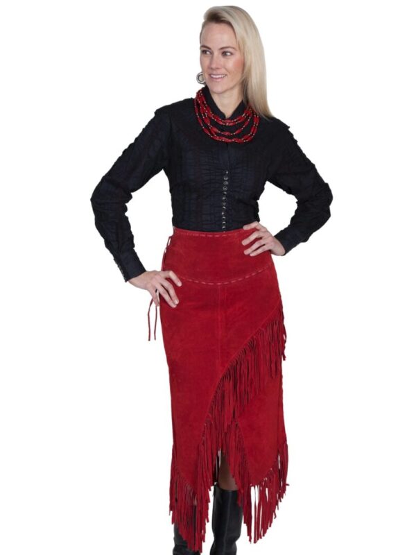 A woman wearing a Womens Native Long Red Fringe Skirt.