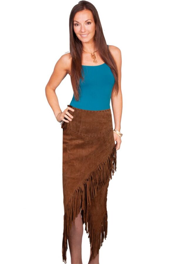 A woman is posing for a picture wearing a Women's Cinnamon Boar Suede Native Long Fringe Skirt with western vibes.