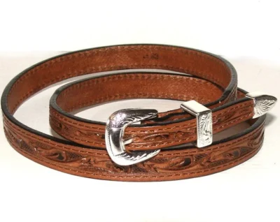 <div class="qsc-html-content"> Brown tooled leather Silver buckle cowboy hat band <ul> <li>100% leather</li> <li>Silver buckle</li> <li>1/2" wide fits up to 25"</li> <li>USA MADE</li> </ul> </div> •