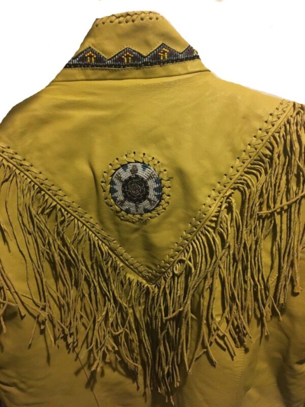 The back of a Womens Natural Leather Native Beaded Fringe Jacket w/ lining.