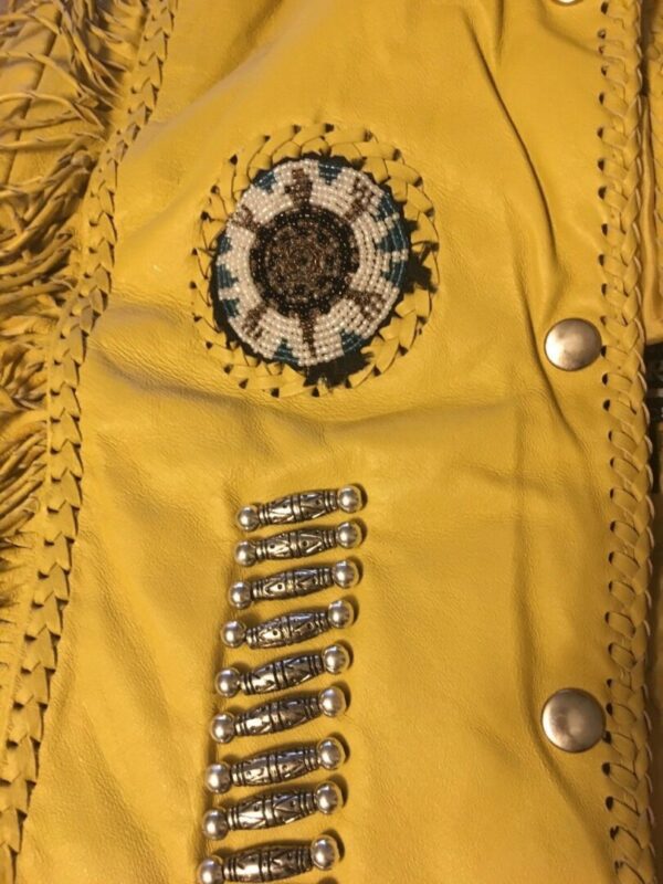 A Womens Natural Leather Native Beaded Fringe Jacket with lining.