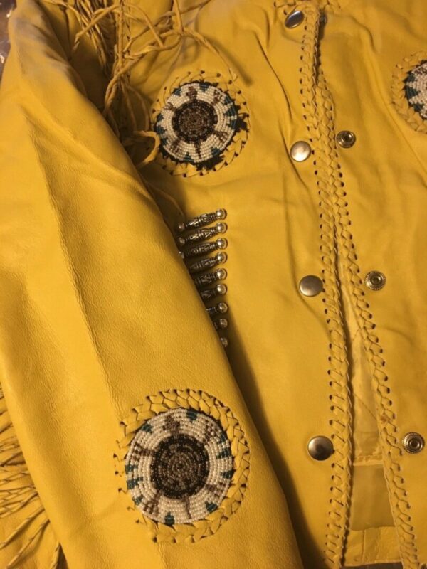 A Women's Natural Leather Native Beaded Fringe Jacket with lining.