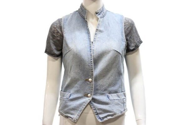 A mannequin wearing a womens stone wash denim western vest.