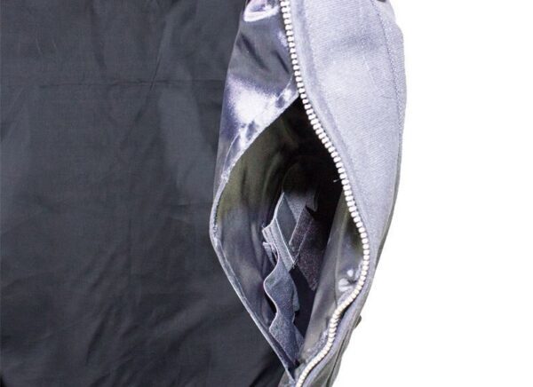 A Mens Black Canvas Zip Up Concealed Carry Vest with a zippered pocket.