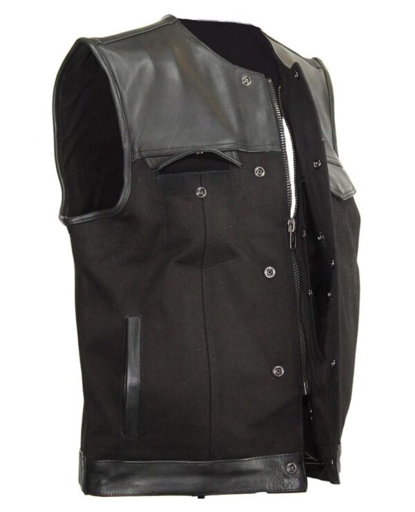 A Mens Black Denim Split Leather Trim Concealed Carry Vest on a mannequin.