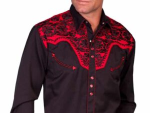 A man wearing a black and red western shirt.