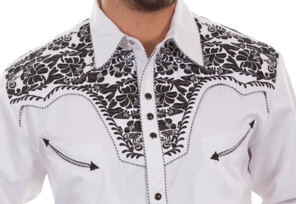 A man wearing a "Gunfighter" Mens Black Embroidered White Western Shirt