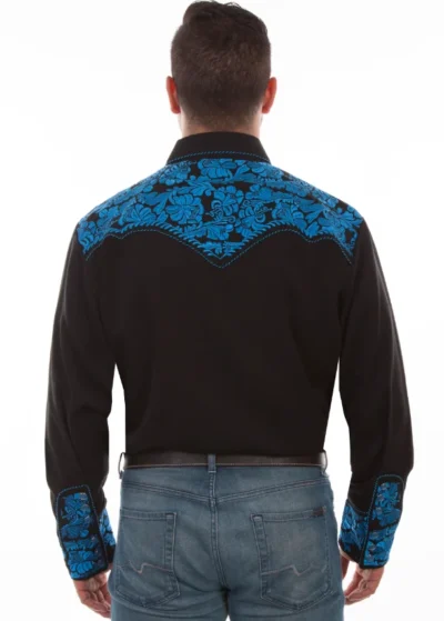 The back of a man wearing a black and blue floral shirt, paired with a "Royal Gunfighter" Mens Scully Royal Blue Retro Western Shirt.