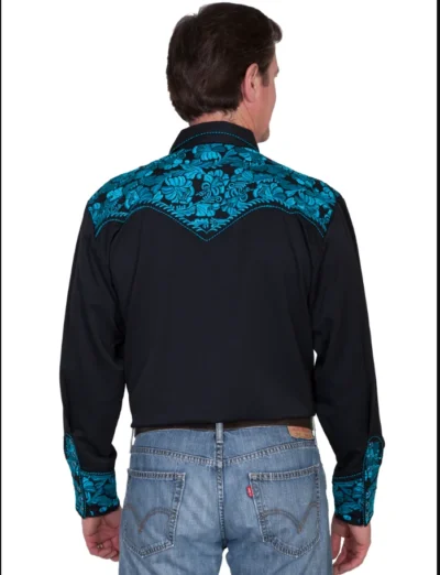 A man wearing a "Turquoise Gunfighter" mens turquoise embroidered western shirt.