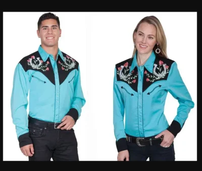 A man and woman wearing the "Winners Circle" Mens Turquoise Western shirts by Scully.