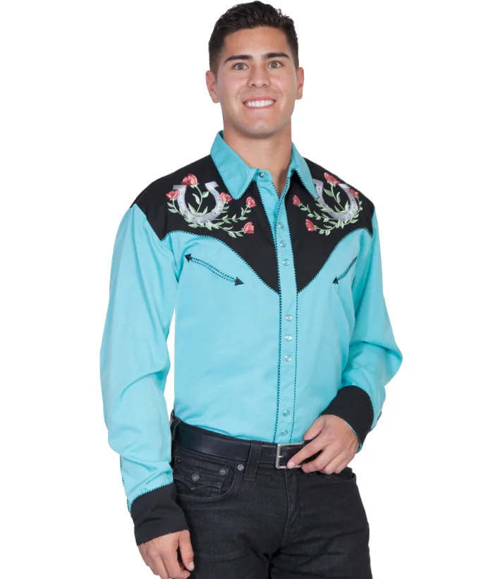 A man wearing a "Winners Circle" Mens Turquoise Western shirt by Scully.