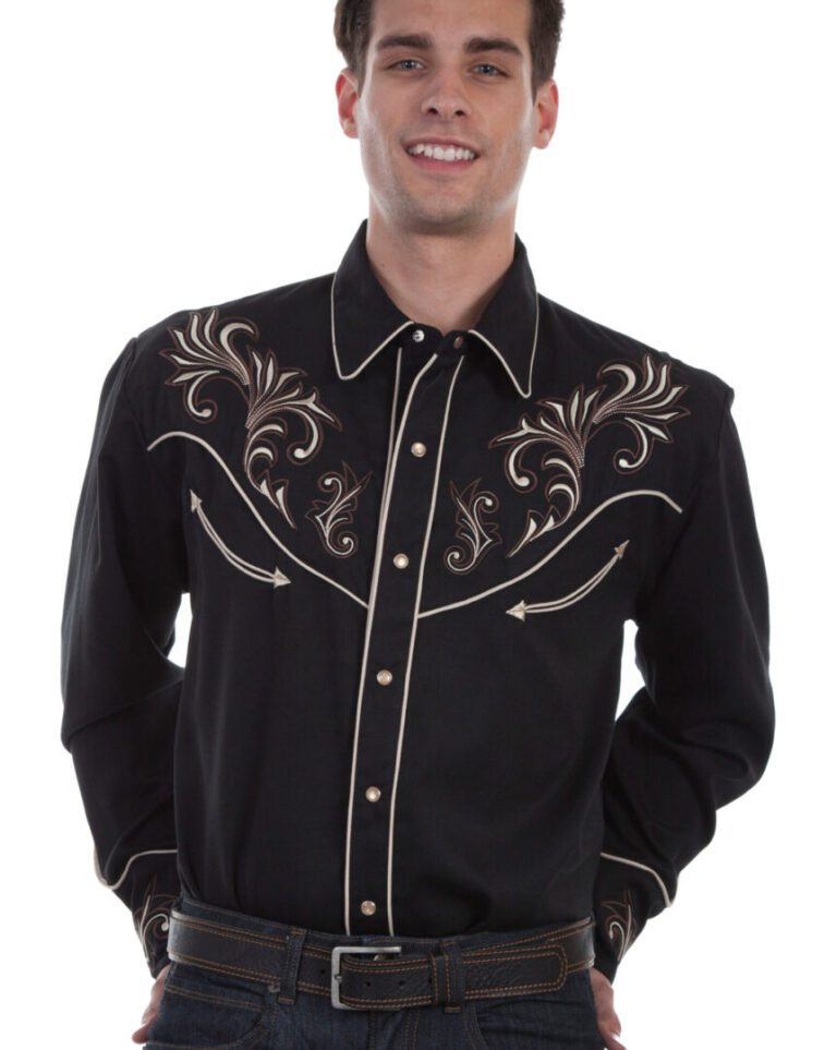 A man wearing a Mens Scully Black and Brown Scroll Embroidered Western Shirt and jeans.