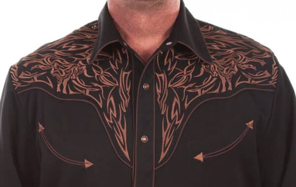 A man wearing a "TRI-BULL" Men's Scully Brown Embroidered Cowboy Shirt.
