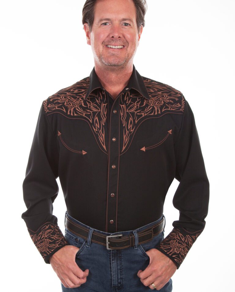 A man wearing a "TRI-BULL" Men's Scully Brown Embroidered Cowboy Shirt and jeans.
