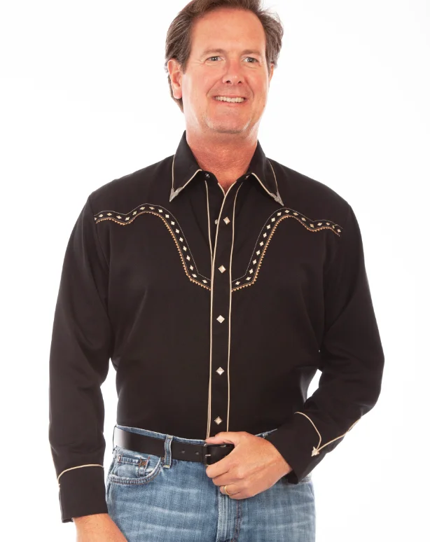 A man wearing the "Night Hawk" Mens Scully Diamond Snap Embroidered Western Shirt and jeans.