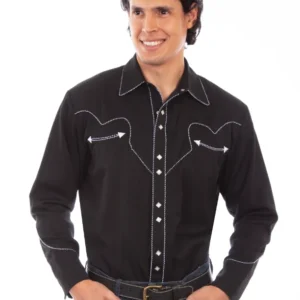 A man wearing a Mens Scully Rockabilly White piped black Western Shirt and jeans.