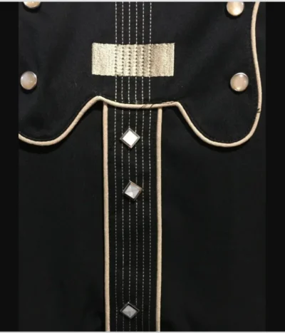 A close up of a Mens Scully Black Bib Embroidered Guitar Shirt with gold buttons.