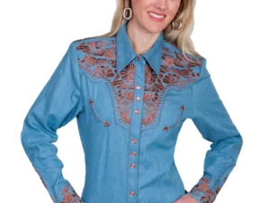A woman wearing a Scully Womens Blue Denim Embroidered Western Shirt and cowboy hat.