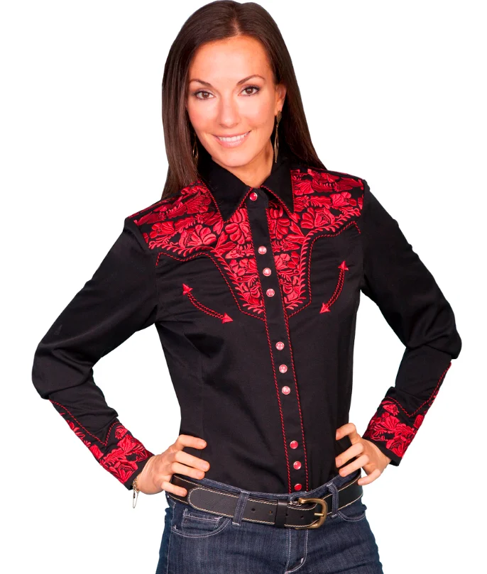 A woman wearing a Lady Crimson Gunfighter Red Womens western shirt by Scully.