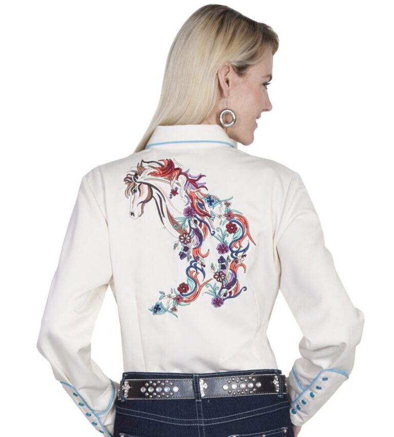 The back view of a woman wearing a Scully womens colorful horse embroidered cream western shirt.