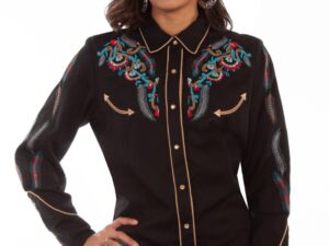 A woman wearing a Scully Women's Embroidered Feathers Black Denim Western Shirt and jeans.