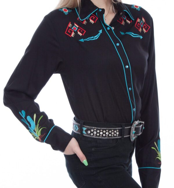 A woman is posing in a Womens Scully Turquoise Cactus Retro Black Western Shirt.