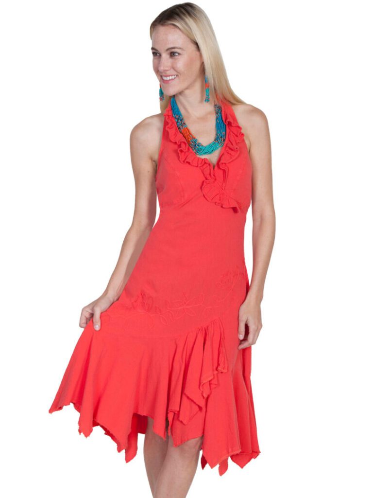 A woman in a Scully Womens V Neck Peruvian Cotton Orange Ruffled Halter Dress is posing for a photo.