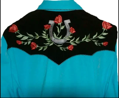 A "Winners Circle" mens turquoise western shirt by Scully with roses and a horseshoe on it.