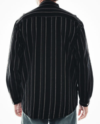 A man wearing a Mens Scully Black Stripe Chest Pocket Banded Collar Shirt.