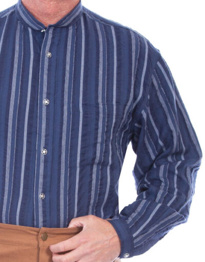 A man wearing a Mens Scully Blue Stripe Chest Pocket Banded Collar Shirt.