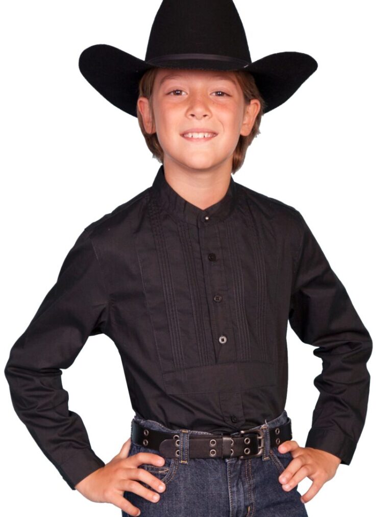 A young boy wearing a cowboy hat and jeans.
