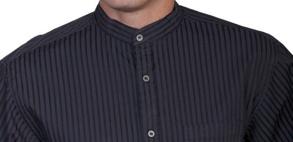 A man wearing a Mens Scully Black Tonal Chest Pocket Banded Collar shirt.