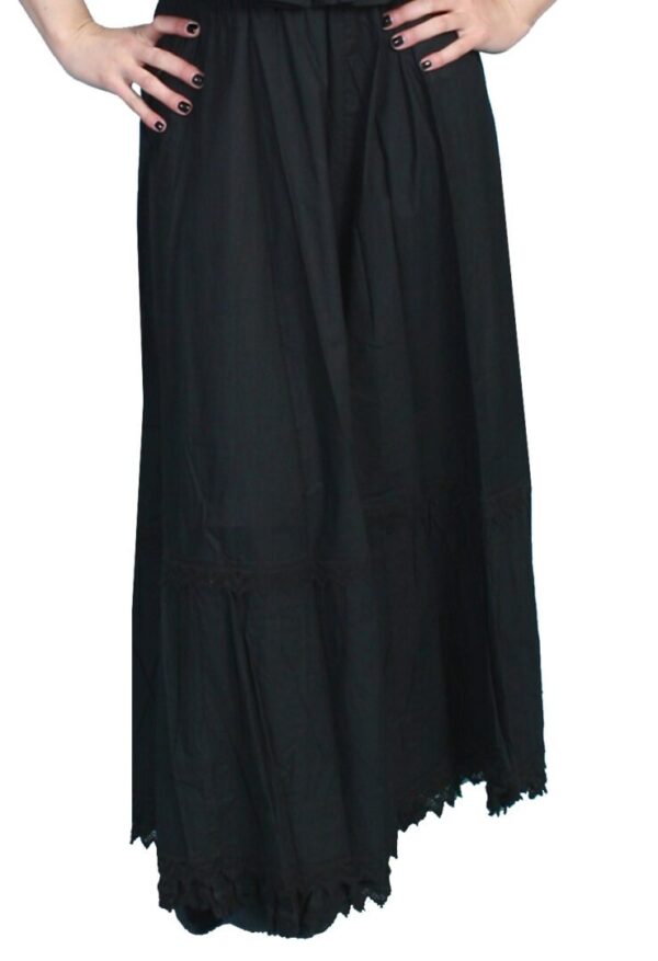 A woman wearing a Scully Womens Prairie Black Cotton Petticoat Skirt and blouse.