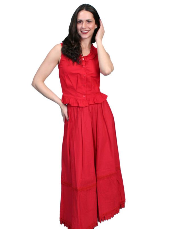 A woman in a red dress posing for a photo.