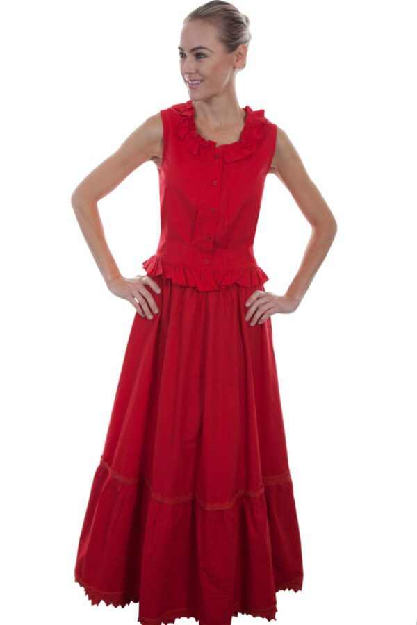 A woman in a red dress posing for a picture.
