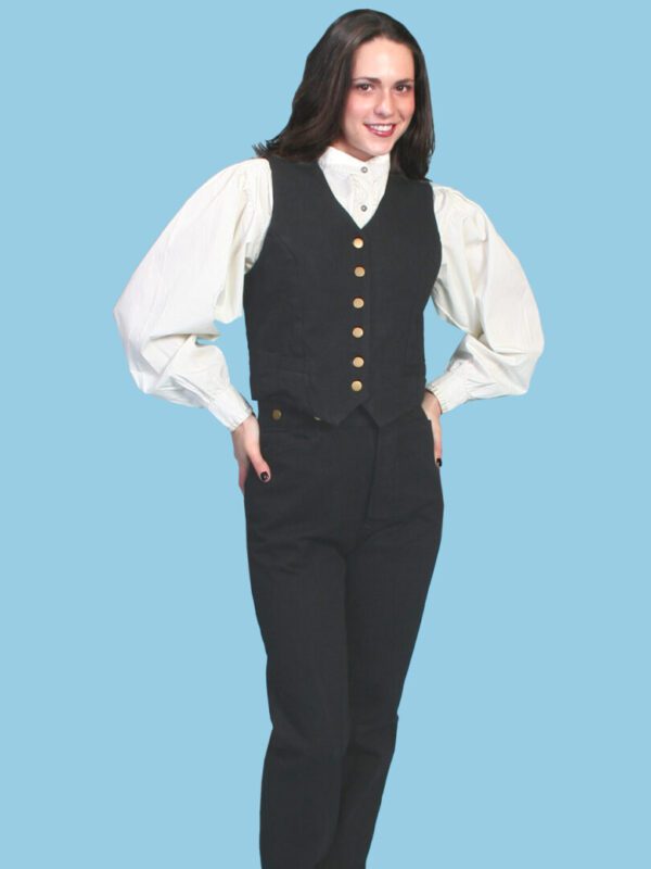 A woman wearing a Women's Scully USA Made cotton canvas Black western vest and white shirt.