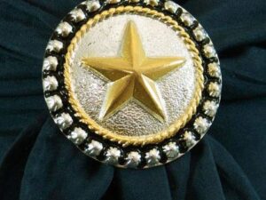 A Two Tone Silver Gold Star Western Scarf Slide with a gold star on it.